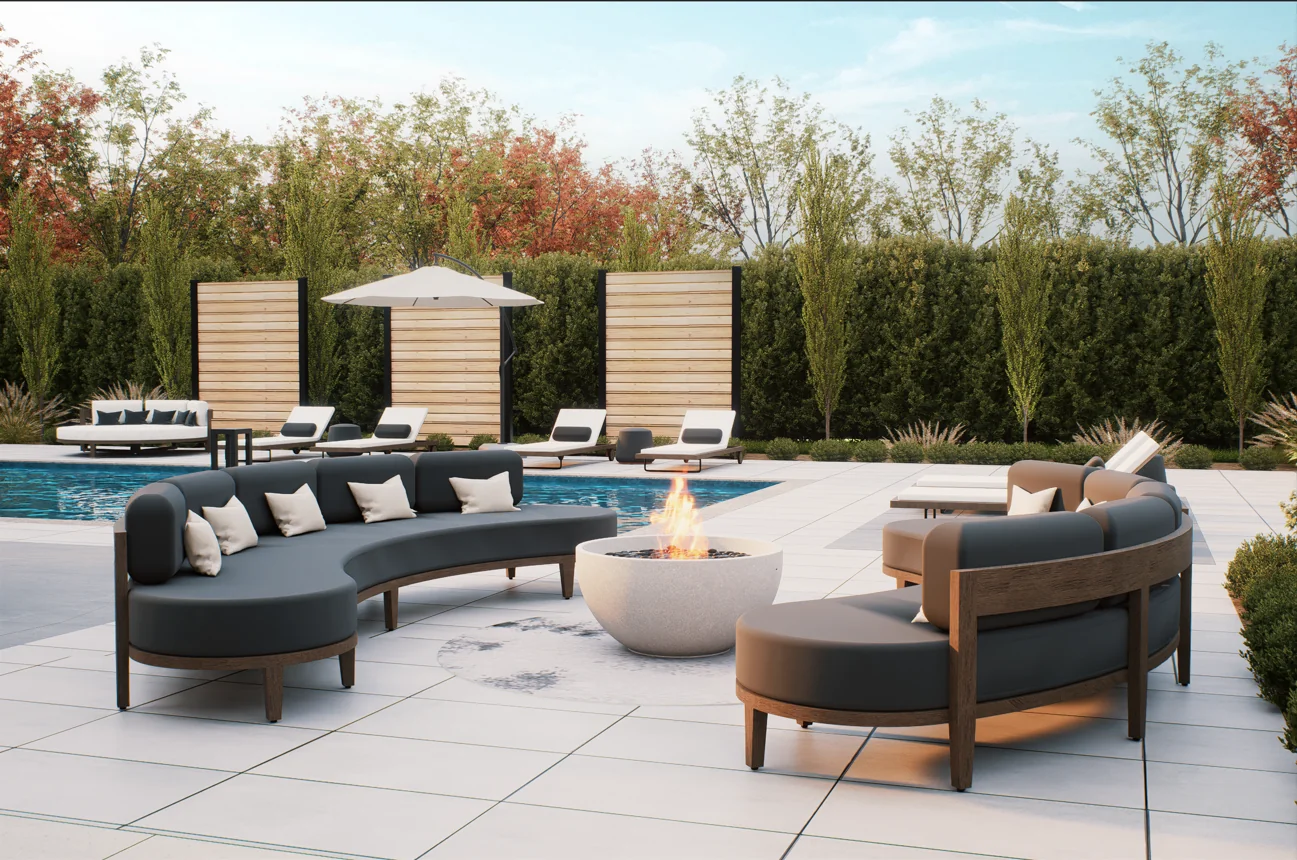 Curved KNI outdoor sofas arranged around a fire bowl
