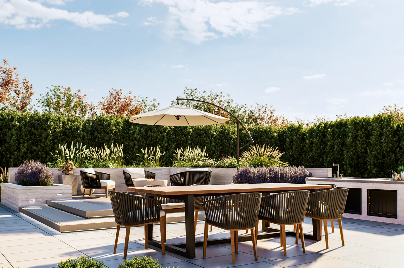 KNI outdoor dining table with woven chairs on a landscaped patio
