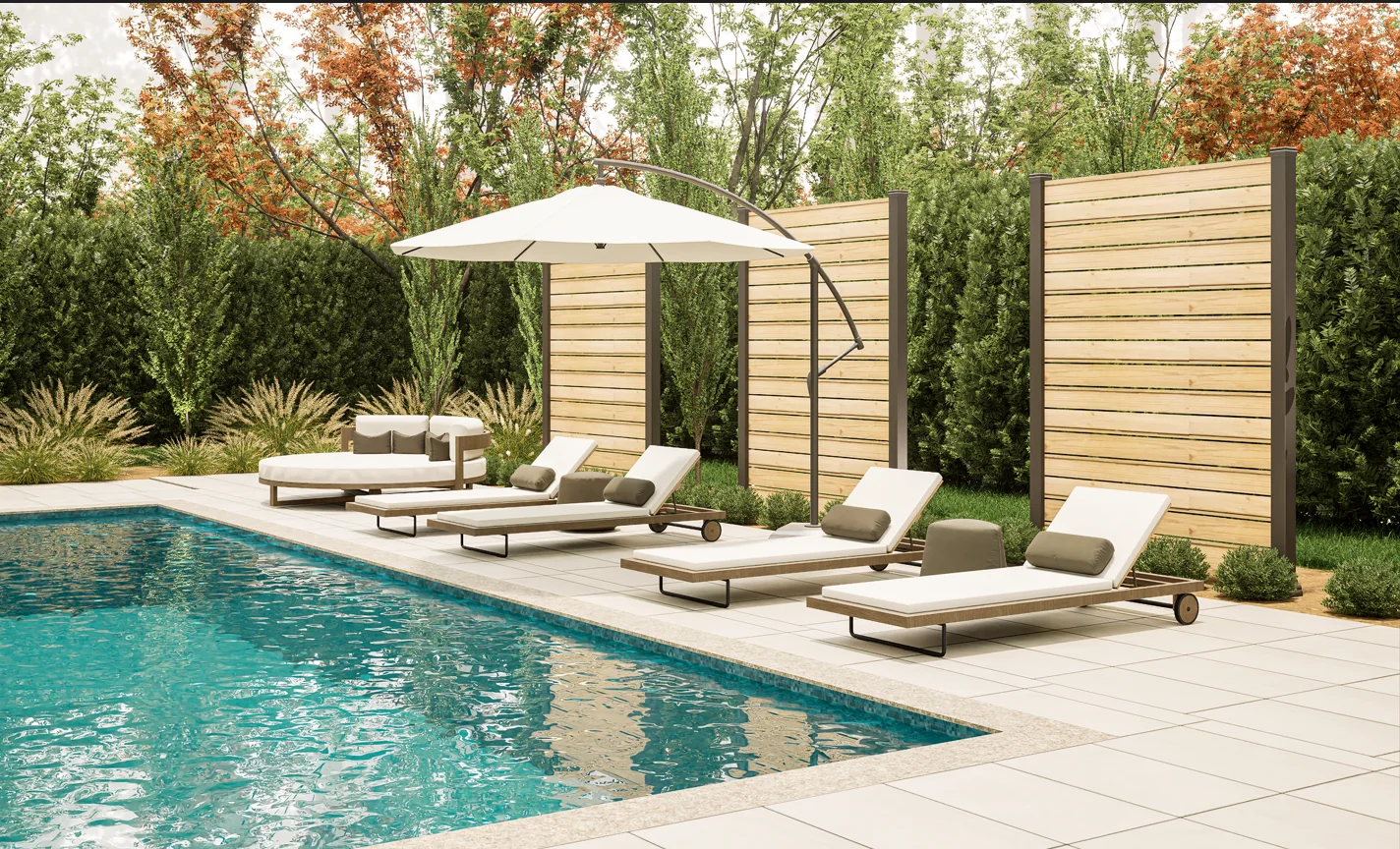 KNI poolside sun loungers and seating beneath an umbrella